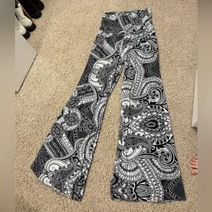 Comfortable flare leg dress pants with fun print.